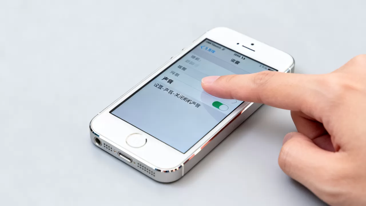 iphone5s日版拍照声音怎么关，iphone5s日版拍照声音